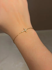 Bracelet doré croix