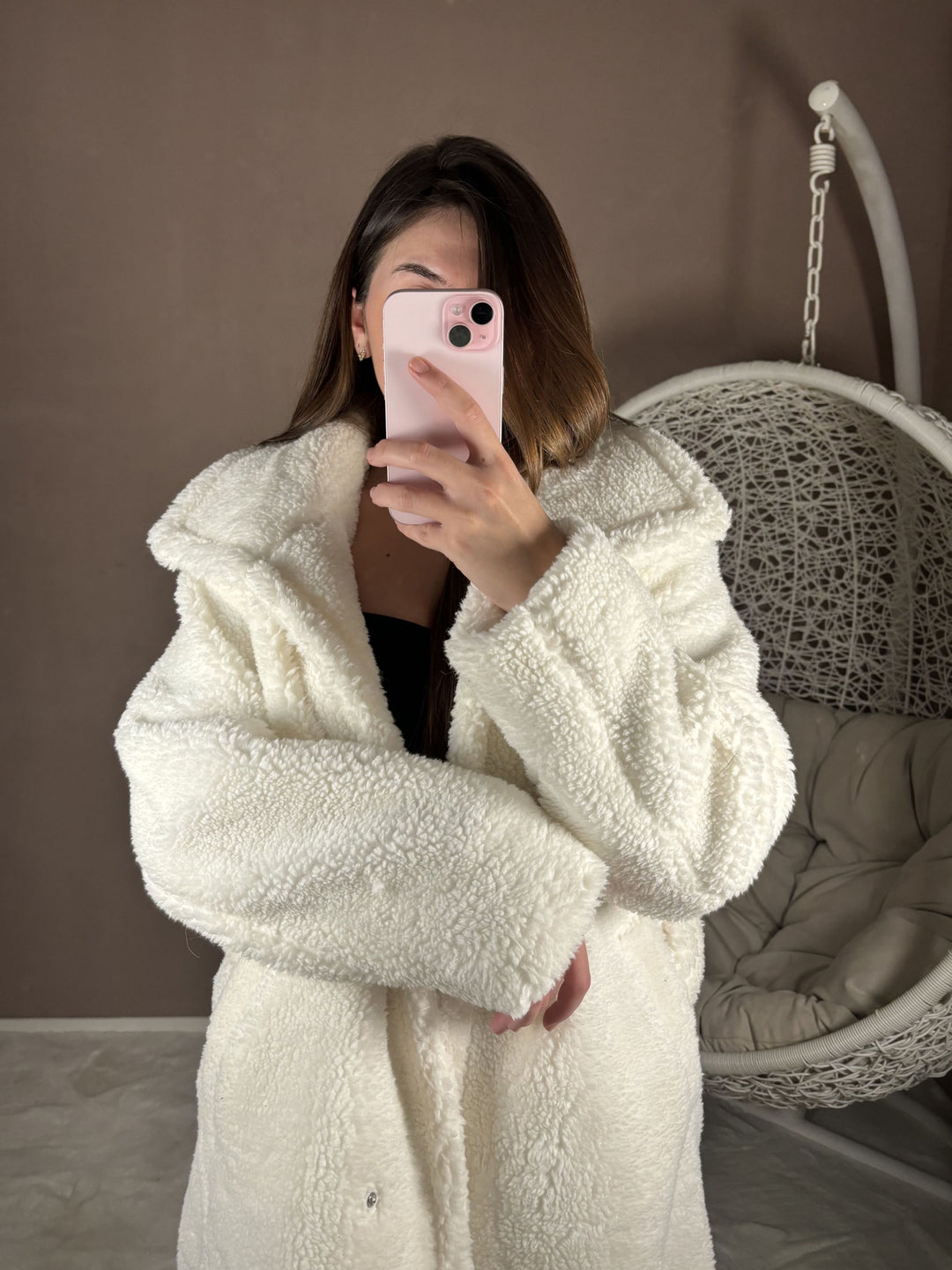 Manteau blanc en moumoute